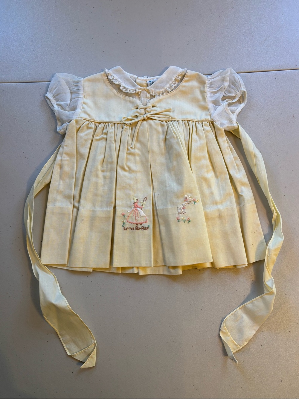 Nanette Baby Yellow Pleated Dress with Sheer Puff Sleeves